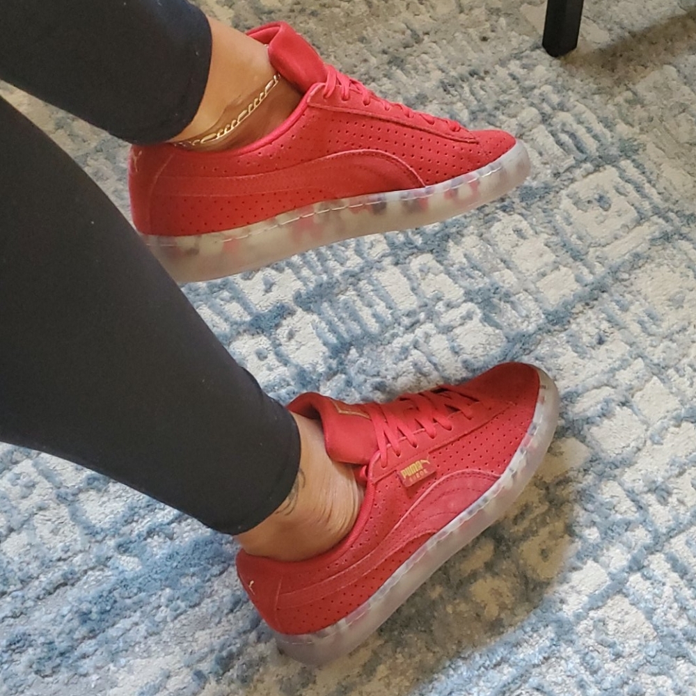 Pumas, red suede